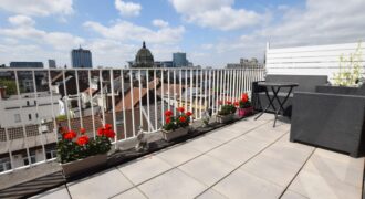 Appartement lumineux de 66M² avec belle terrasse vue plongeant sur la ville.